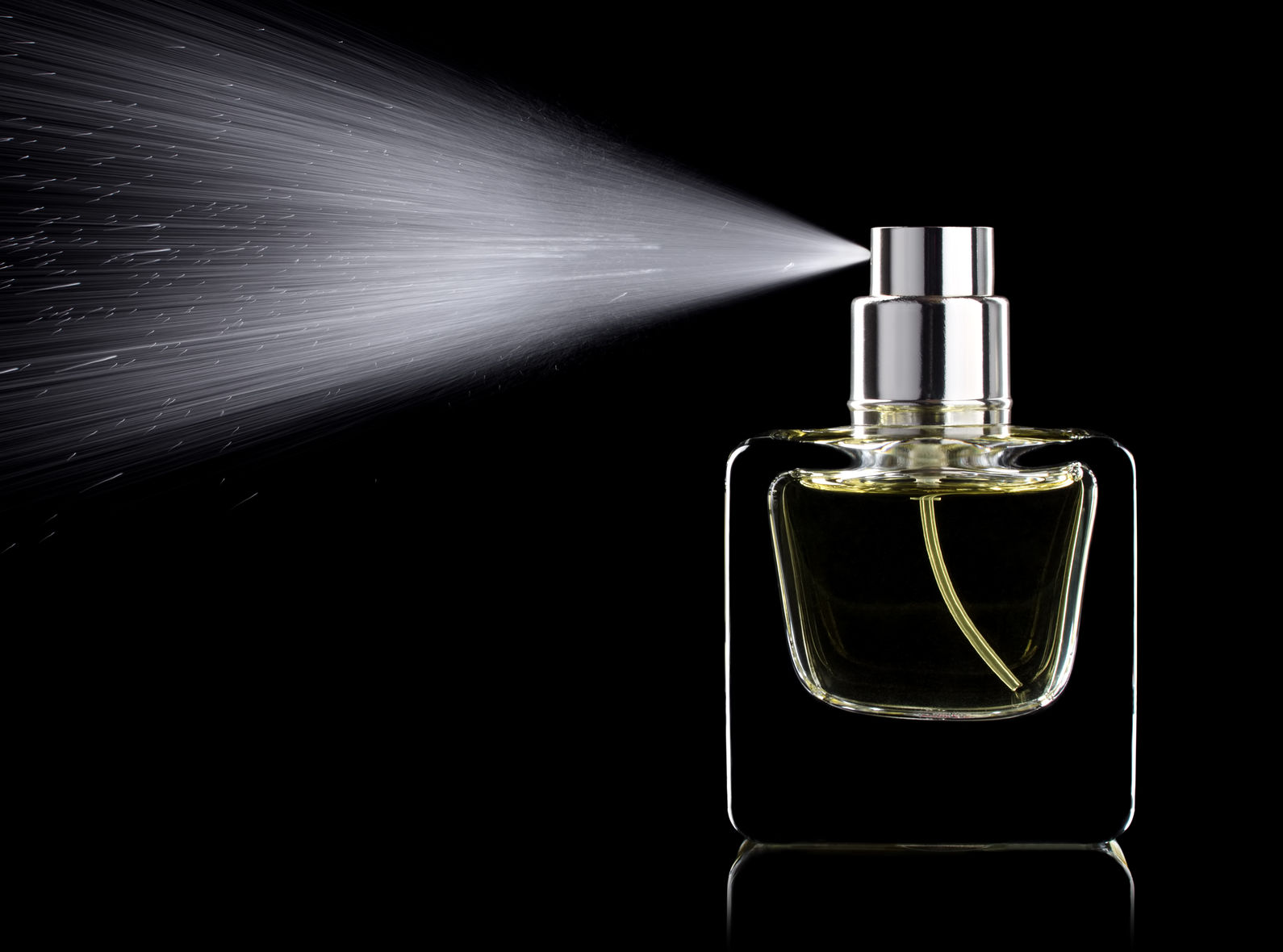 spraying perfume