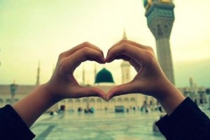 The-Prophet-s-Mosque-Through-Heart-Hand-Gesture-Al-Masjid-an-Nabawi-The-Prophets-Mosque-in-Madinah-Saudi-Arabia-